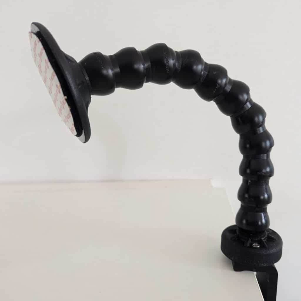 Support articulé Flexzi noir avec scratch fourni pour fixer un contacteur, conçu pour une utilisation adaptée